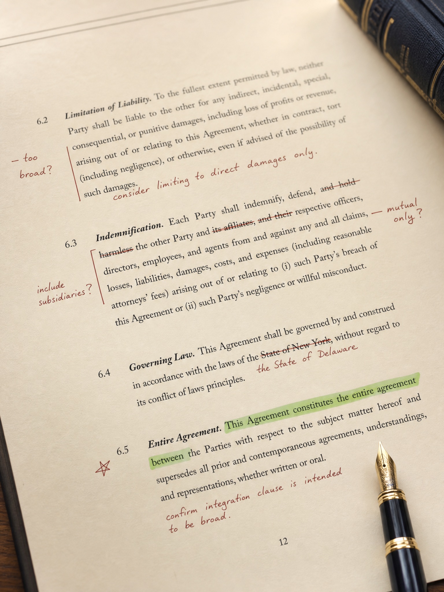 A contract marked up with redline edits and margin notes
